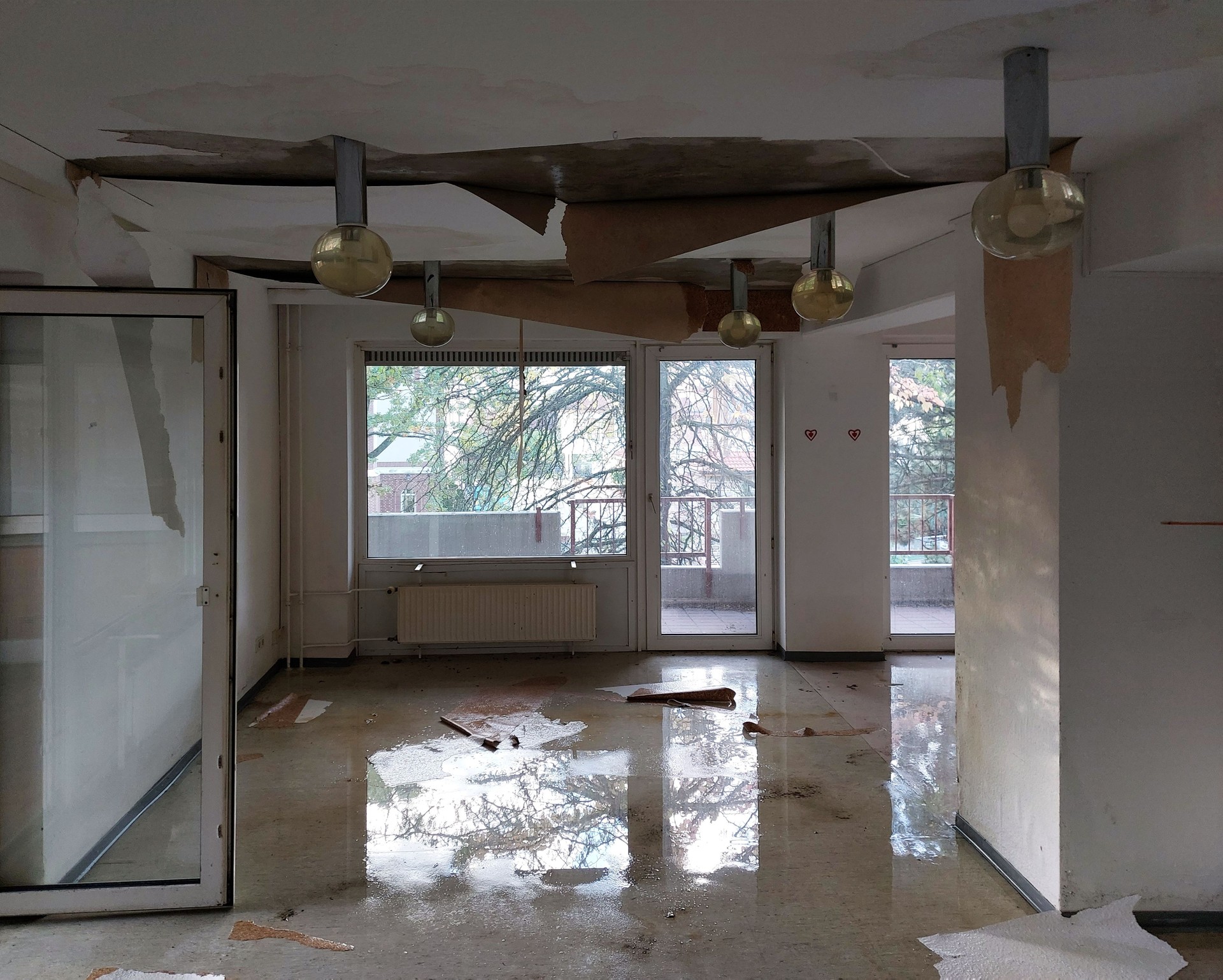 Water damage in interior room of abandoned building